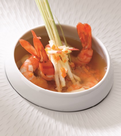 King prawns served in Pommeau-flavoured stock
